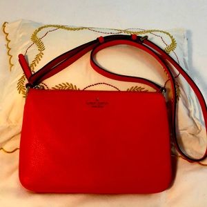 Kate Spade handbag, in coral. Perfect size for all your needs.